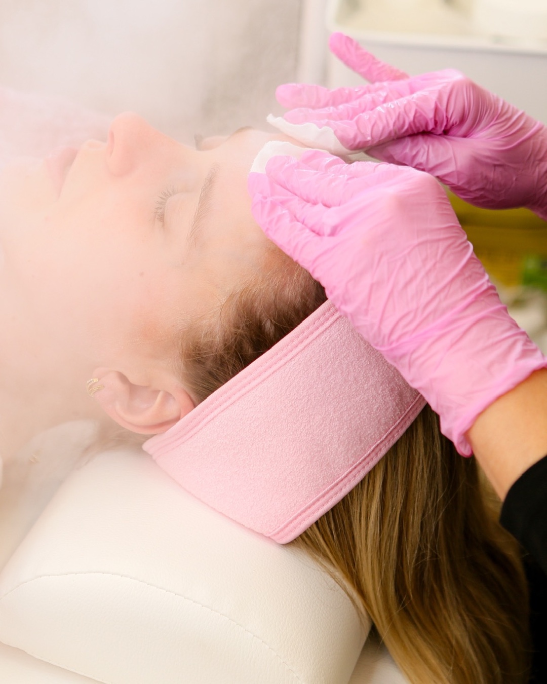 Client receiving a steamed deep cleanse facial at LA Skin Spa