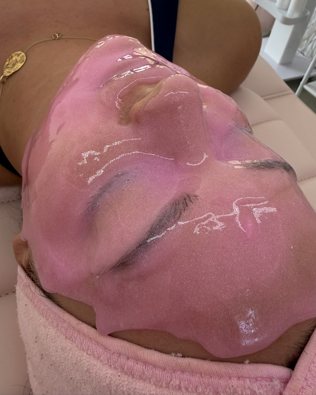 Client relaxing with a blush-pink hydro jelly mask at LA Skin Spa